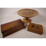 A turned walnut pedestal tazza, 6" high, 12" diameter, together with two wooden trinket boxes