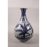A Chinese blue and white porcelain vase with floral decoration, 6 character mark to side, 13" high