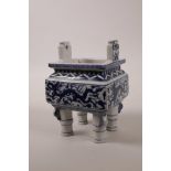 A Chinese blue and white porcelain censer raised on feet in the form of bamboo, with dragon