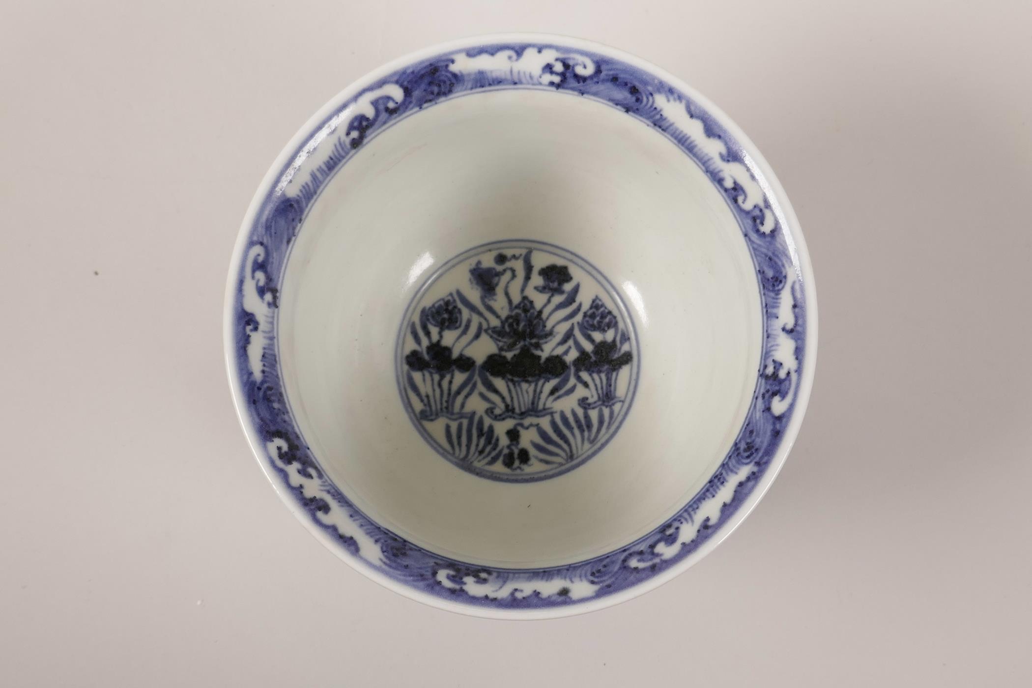 A Chinese blue and white porcelain steep sided bowl decorated with carp in a lotus pond, 4" high x - Image 6 of 7