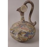 A Southern European earthenware vase painted with dolphins, 12" high