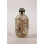 A Chinese reverse painted glass snuff bottle decorated with squirrels, inscription verso, 4" high