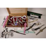 A box of various wristwatches etc