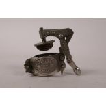 A vintage champagne stopper with Aubert & Fils branding, 2" x 2½"