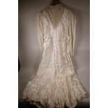 An Edwardian white satin evening dress