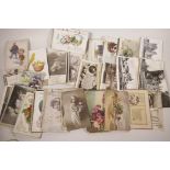 Approximately 100 early postcards, including many Christmas and birthday greetings
