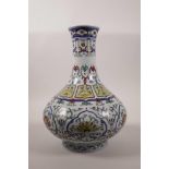 A Chinese doucai porcelain vase with lotus flower pattern decoration, seal mark to base, 12" high
