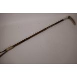 A Callow of London horn handled riding crop with hallmarked silver ferule dated London 1901, 32"