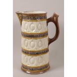 A Wedgwood majolica ale jug bearing an inscription from Shakespeare's 'Comedy of Errors', Act 4, 8½"