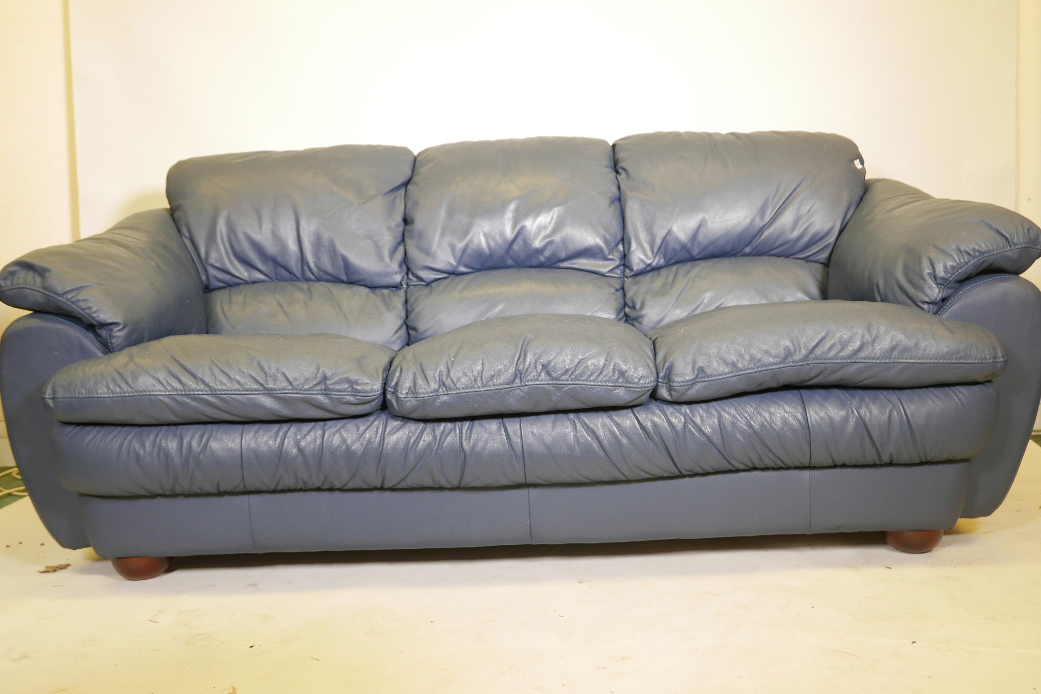 A blue leather three seater sofa, 84" wide - Image 2 of 3