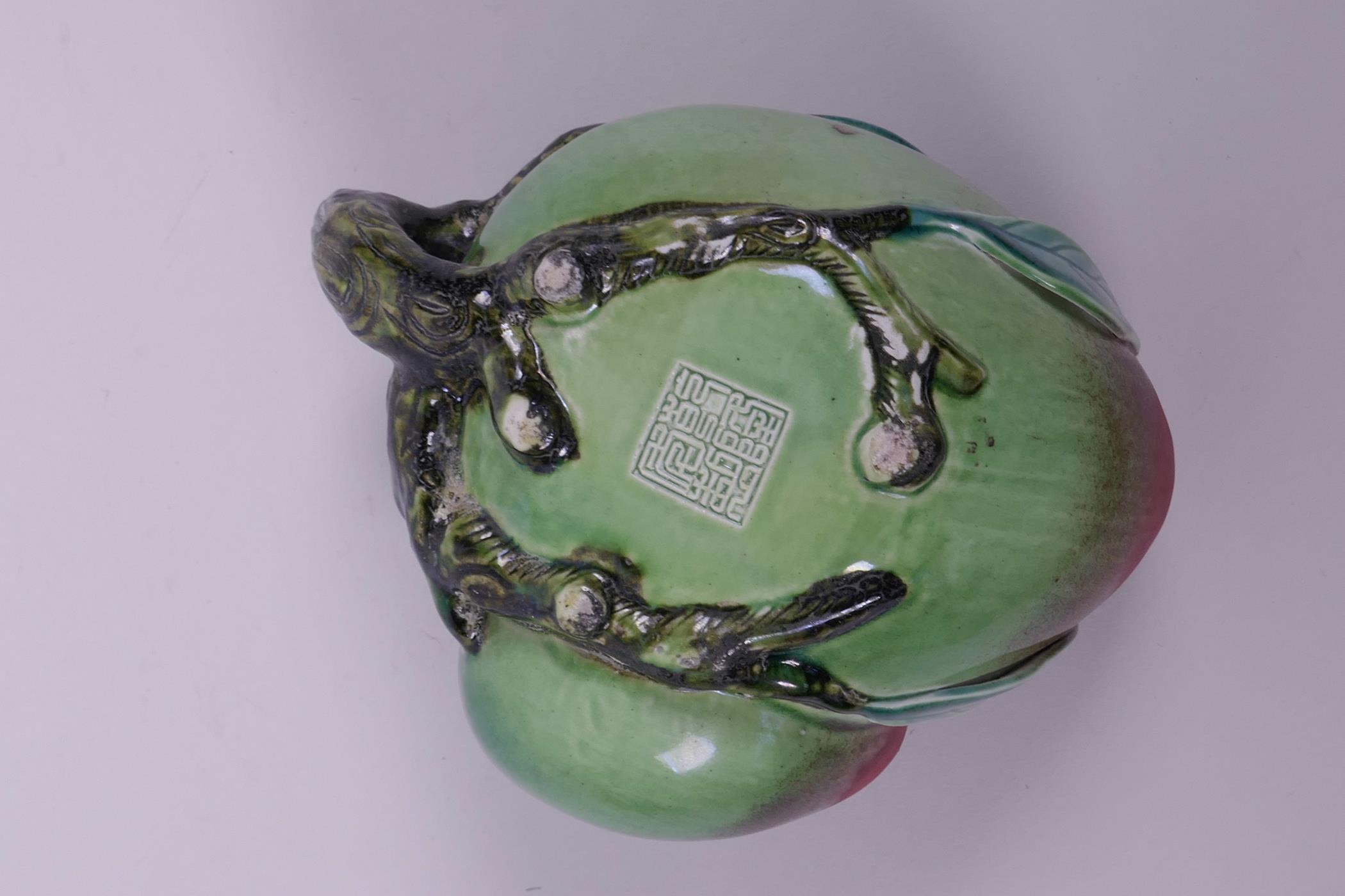 A Chinese polychrome porcelain ink/water pot in the form of a peach, impressed seal mark to base, 5" - Image 5 of 6