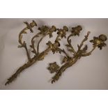 A pair of scrolling leaf form ormolu wall sconces, one A/F, 21" high