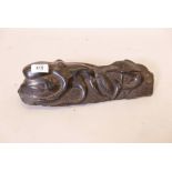 An ebony wood carving of an octopus and swordfish, 13" long