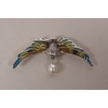 A 925 silver and plique-à-jour brooch in the form of a hummingbird with a pearl drop, 2½" wide