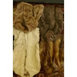 A fox fur jacket, together with a short fur jacket by Ritter Bros, New York, a grey fur jacket and a