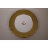 A Raynaud Limoges porcelain plate with gilt rim and bearing the Royal Crest of Sultan bin