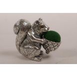 A novelty sterling silver pincushion in the form of a squirrel, 1"