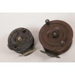 A vintage Bakelite fishing reel by Steelite Sydney, 5" diameter, together with a 4" diameter reel