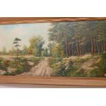 An oil on canvas, autumnal woodland landscape, signed indistinctly, 39½" x 19½"