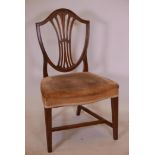 A C19th mahogany Hepplewhite shield back chair
