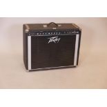 A Peavey series 240T valve amplifier, 27" x 11" x 21"