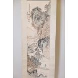 A Chinese watercolour scroll of a riverside landscape with fisherman to foreground, 12½" x 43"