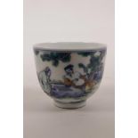 A Chinese porcelain tea bowl decorated with figures playing Go, 6 character mark to base, 3"