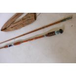 A vintage cane two section fishing rod, 123" long