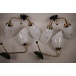 A set of four 1950s/60s wall lights with enamel painted glass shades, 2 x two branch light and 2 x