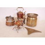 An Algerian copper cooking pot, with brass planter with stylised palm decoration, a brass wall