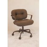 A mid C20th adjustable swivel armchair