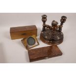 A turned wood triple candlestick with bone embellishments, together with a treen watch holder,