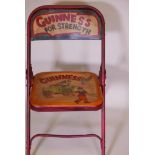 A folding metal chair painted with an advertisement for Guinness