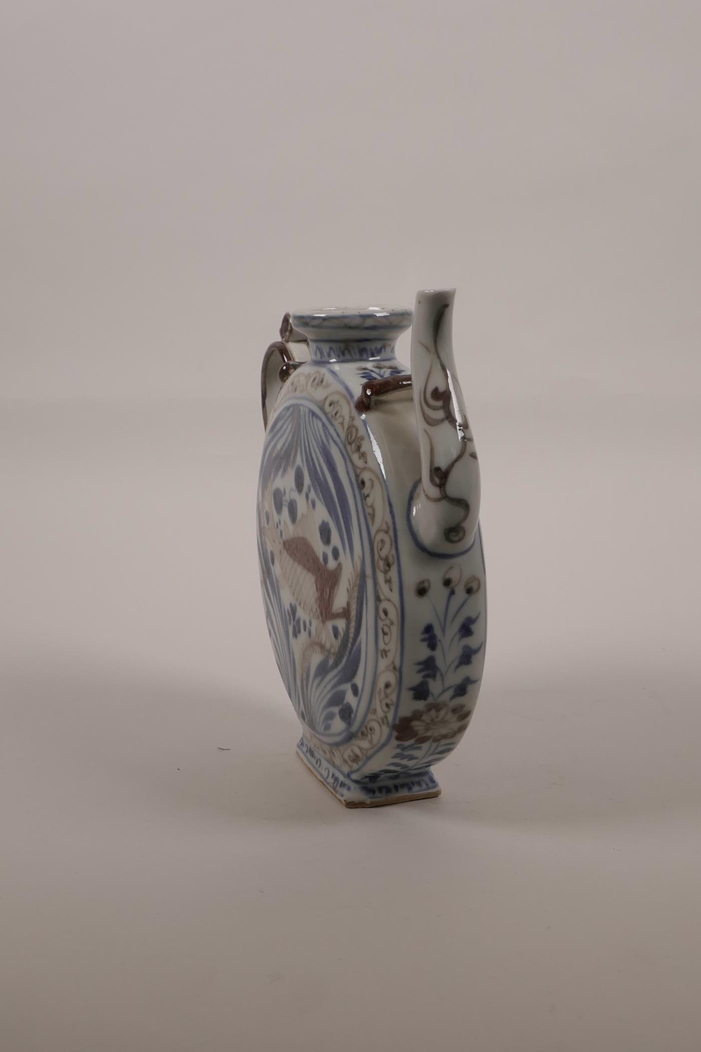A Chinese blue and white porcelain teapot of slender form decorated with a red carp, 6½" high - Image 2 of 5