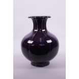 A Chinese purple flambé glazed vase of lobed form, 6 character mark to base, 10" high