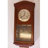 A C19th oak bracket clock, the brass dial with silvered chapter ring and Roman numerals, the