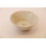 An antique Chinese celadon glazed ceramic bowl, 5" diameter