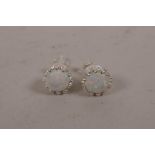 A pair of silver and opalite stud earrings