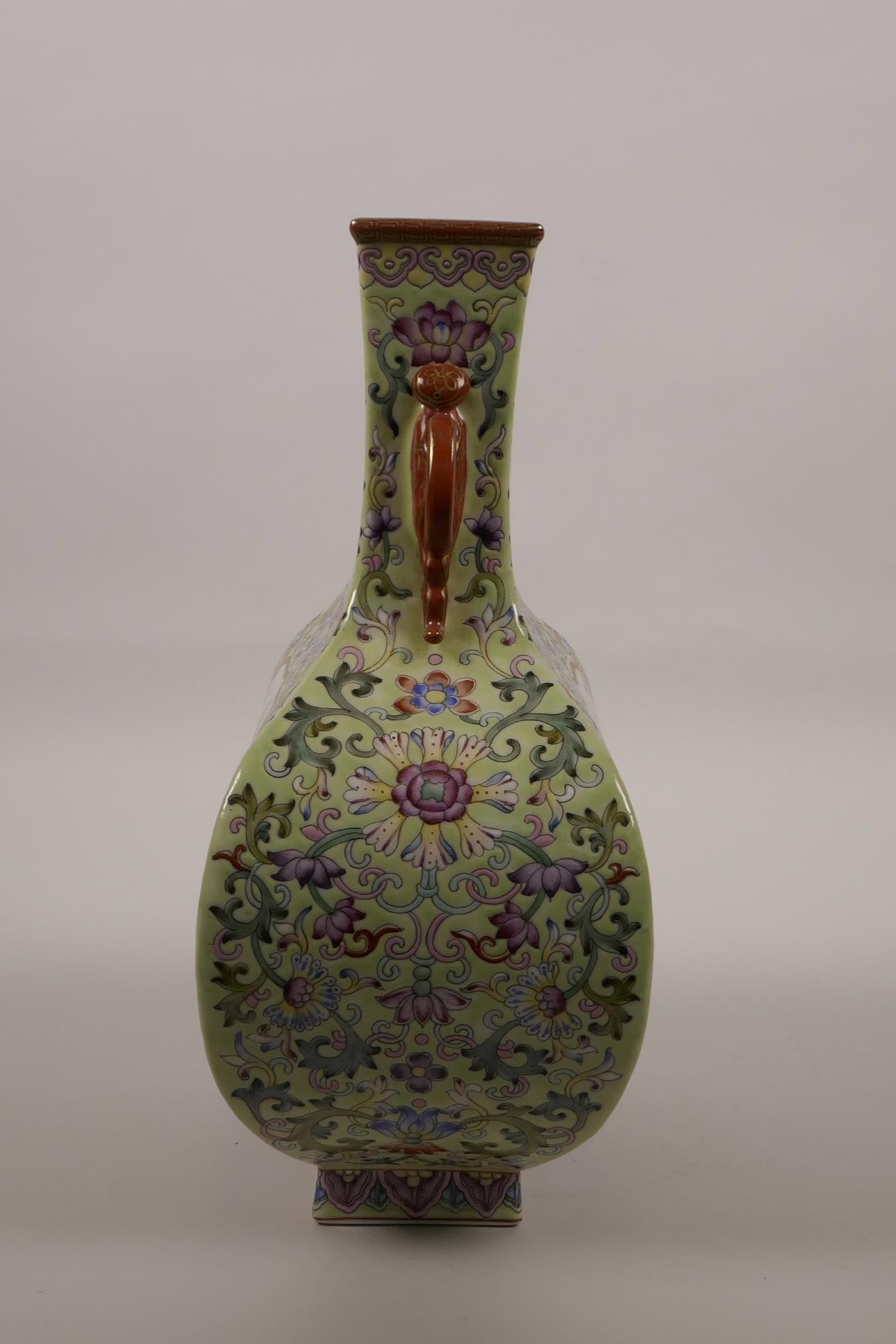 A Chinese polychrome enamelled porcelain vase with two bat shaped handles and decorative panels - Image 4 of 5