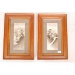 A pair of Japanese paintings en grisaille, Mount Fuji and a pagoda in a landscape, in oak frames,