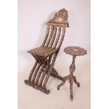 An Ottoman folding chair and occasional table, with mother of pearl inlaid decoration, both A/F