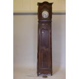 A C19th French comtoise longcase clock, with inlaid and carved fruitwood case, the enamel dial set