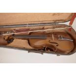 A violin and bow in a wooden viola case, 23" long