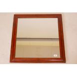 A C19th cushion frame with faux bois decoration, fitted with a mirror, rebate 23" x 23"