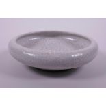 A Chinese crackleware bowl with a rolled rim, 7" diameter