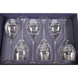 A boxed set of six long stem crystal wine glasses with cut decoration by Crowne, 10½" high