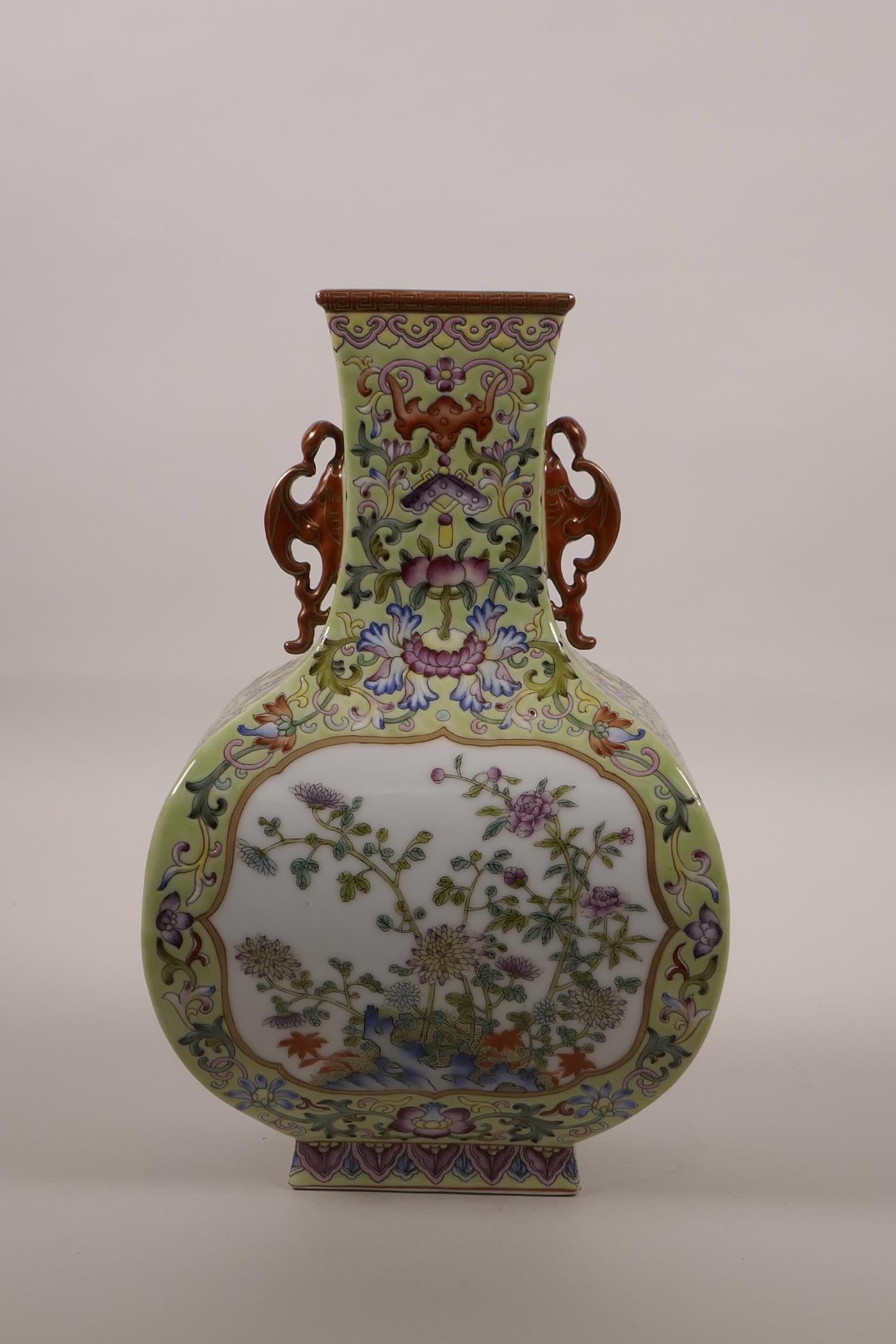 A Chinese polychrome enamelled porcelain vase with two bat shaped handles and decorative panels - Image 3 of 5