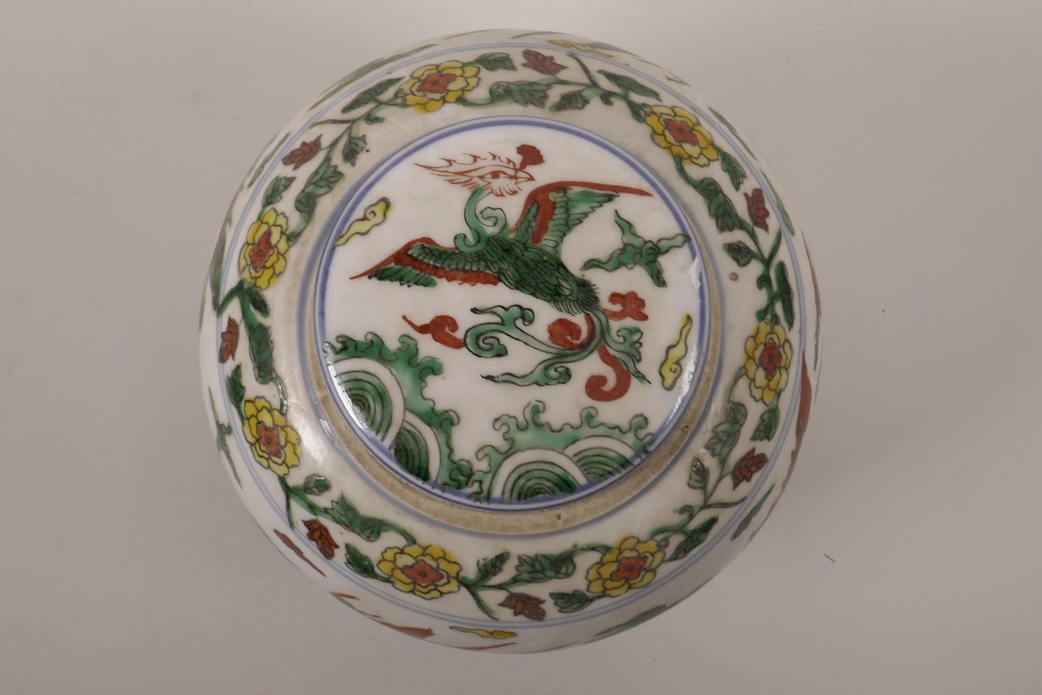 A Chinese wucai porcelain jar and cover decorated with dragons and phoenix in flight, 6 character - Image 3 of 4