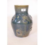 A studio pottery vase with raised decoration of a sailing boat, unsigned, 12" high