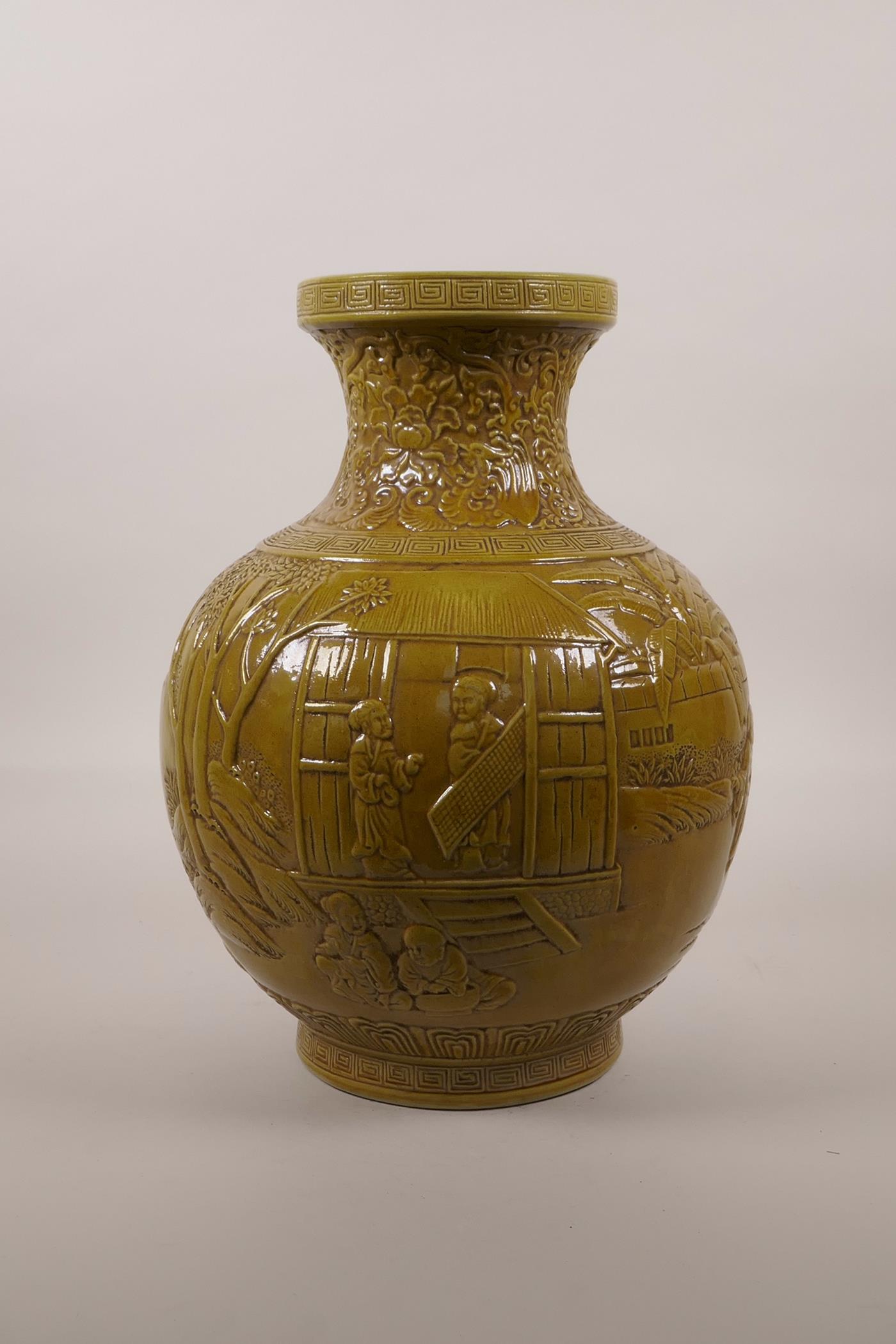 A large Chinese ochre glazed pottery vase with raised decoration of everyday village life, impressed - Image 4 of 5